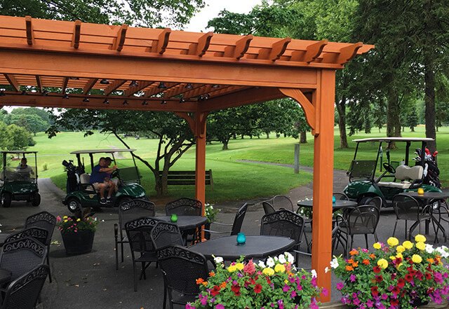 wood pergola at a golf course