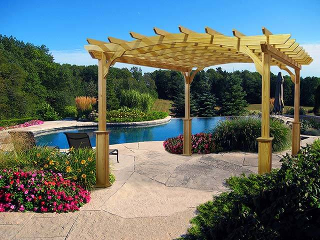 Pergola in a Box next to a pool