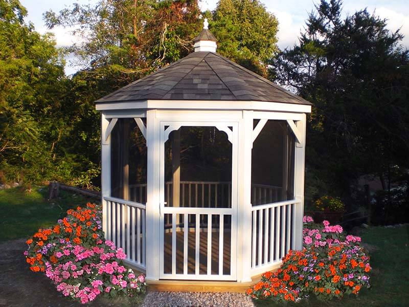 gazebo with screens and flowers