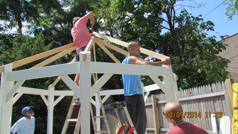 Contractors building a gazebo