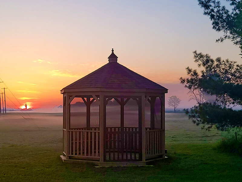 12' wood gazebo in a box at sunset