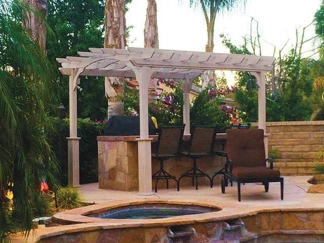 White Pergola in a Box next to a pool