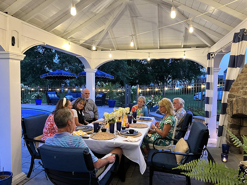 Guests having dinner in a pavilion